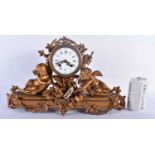 A LARGE 19TH CENTURY FRENCH BRONZE MANTEL CLOCK formed with a central drum encased by two putti.