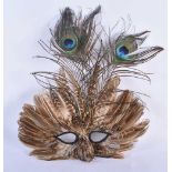 A VINTAGE PEACOCK FEATHER VENETIAN STYLE THEATRICAL MASK. 34 cm x 27 cm.