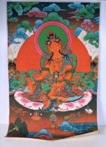 A Tibetan silk Tanka on paper 81 x 58 cm