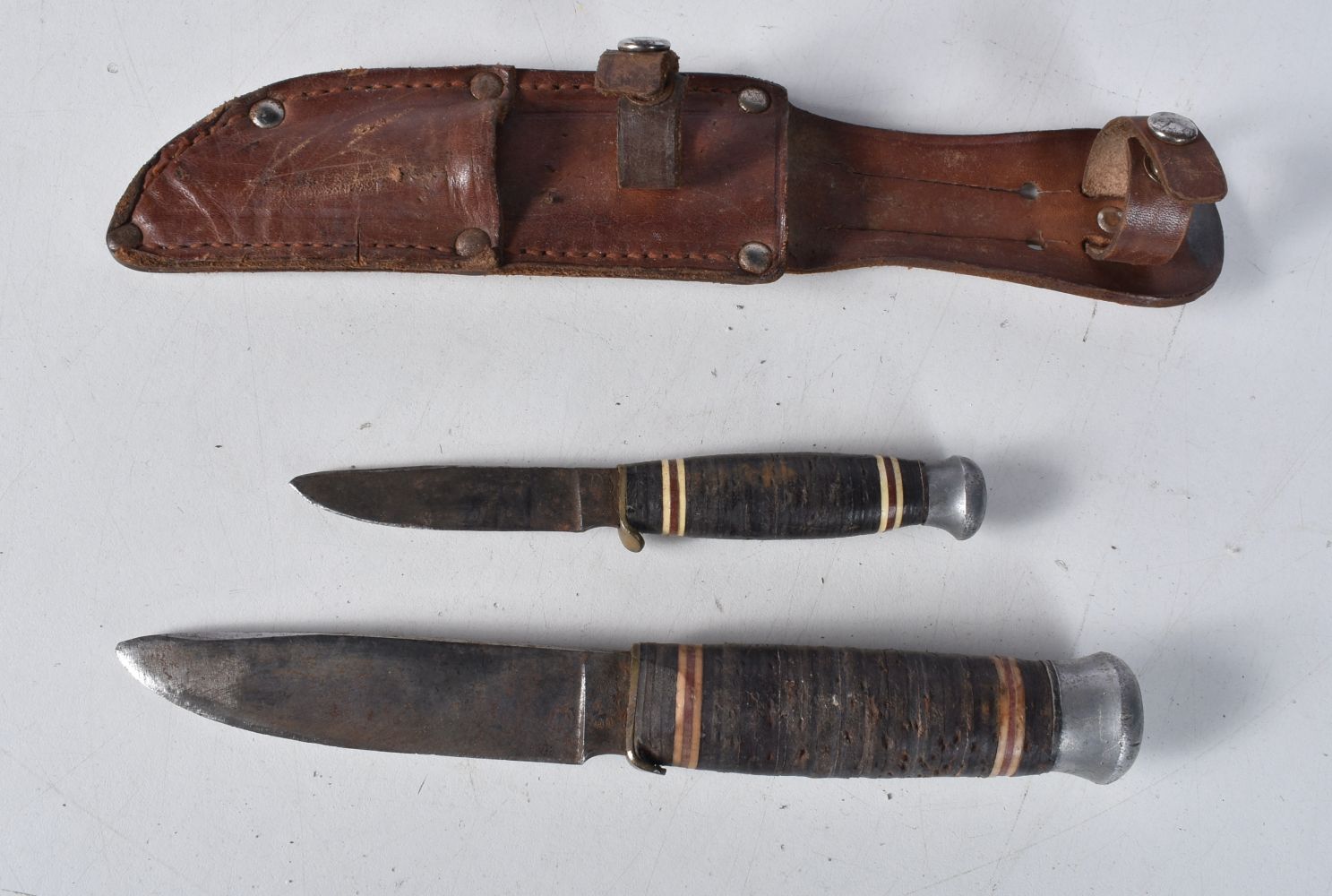 A large Indian Kukri with leather sheath together with a large South American knife with a carved - Image 12 of 12