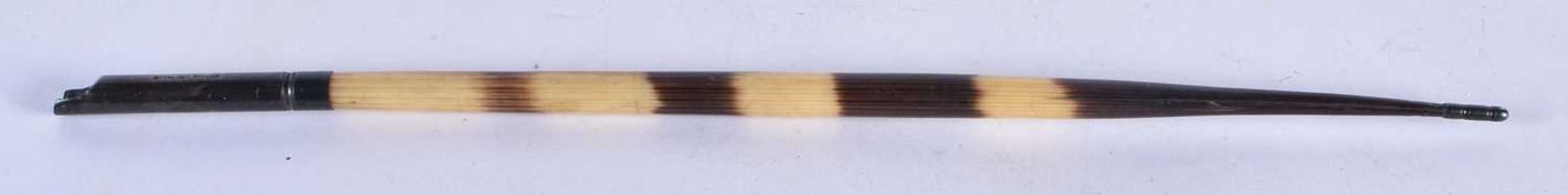 An Antique Porcupine Quill Dip Pen with Silver Mounts. Stamped Sterling. 27cm long