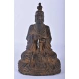 AN 18TH/19TH CENTURY INDIAN TIBETAN NEPALESE BRONZE FIGURE OF A BUDDHA modelled seated with hands