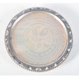 AN ANTIQUE CHINESE MOTHER OF PEARL BROOCH. 11.3 grams. 4 cm diameter.