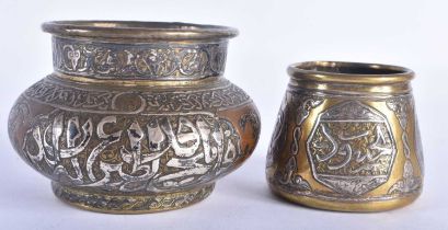 TWO 19TH CENTURY ISLAMIC SILVER INLAID MIDDLE EASTERN BRONZE CENSERS decorated with calligraphy