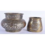 TWO 19TH CENTURY ISLAMIC SILVER INLAID MIDDLE EASTERN BRONZE CENSERS decorated with calligraphy