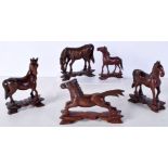 A collection of Chinese carved hardwood horses largest 12 x 10 cm.(5).
