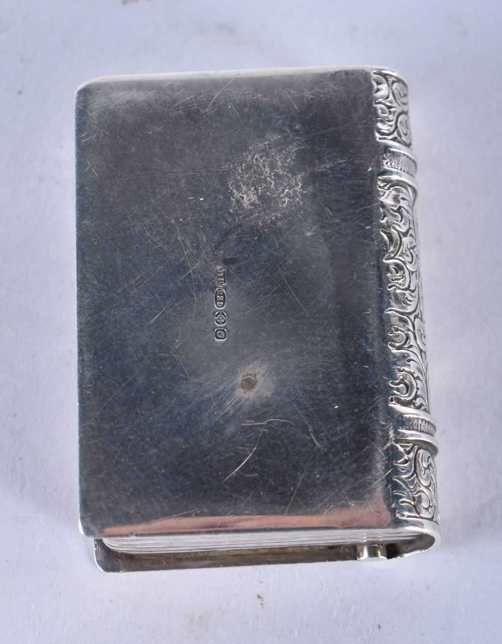 A Silver Pill Box in the form of a Book with Gilt lining. Hallmarked London 1988, 3.5 cm x 2.5 cm - Image 2 of 4