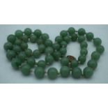 A CHINESE JADE NECKLACE. 80 grams. 67 cm long.