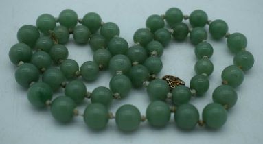 A CHINESE JADE NECKLACE. 80 grams. 67 cm long.