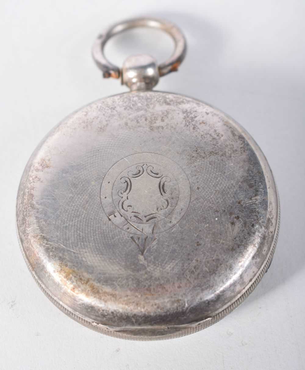 A VICTORIAN SILVER POCKET WATCH. Chester 1895. 154.7 grams. 5 cm diameter. - Image 2 of 4