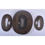 A 19TH CENTURY JAPANESE MEIJI PERIOD IRON TSUBA. 7 cm x 5.5 cm.