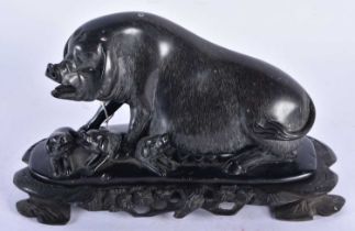 AN UNUSUAL LATE 19TH CENTURY CHINESE CARVED SOAPSTONE FIGURE OF A PIG Late Qing. 22 cm x 14 cm.