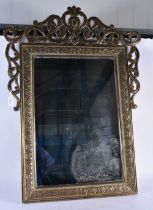 A Brass Framed Mirror. 91cm x 68cm