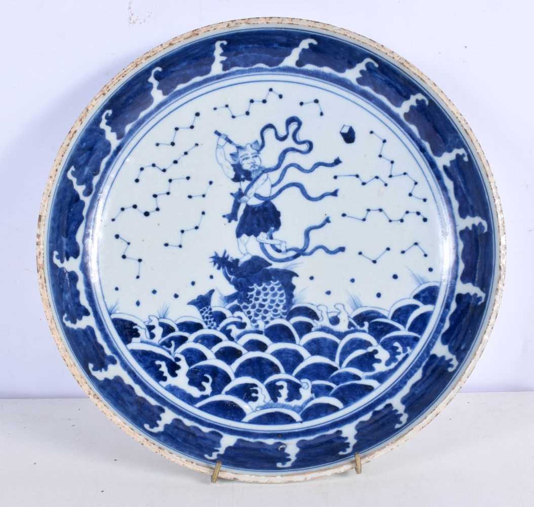 A Chinese Porcelain blue and white dish decorative with a figure riding ab fish 6 x 29 cm. - Image 2 of 6