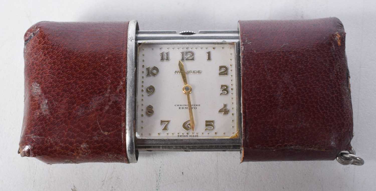 1920s Red Leather Sliding Case Movado Ermeto Travelling Clock, Swiss Made.  3.5 cm x 7.7cm, weight