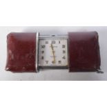 1920s Red Leather Sliding Case Movado Ermeto Travelling Clock, Swiss Made.  3.5 cm x 7.7cm, weight