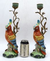 A pair of ormolu mounted porcelain parrot candle stick holder 39 cm (2)