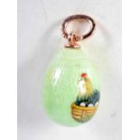 A Continental Enamel Egg Pendant with Gold Mounts. Stamped 56. 1.9cm x 1.2 cm, weight 2.9g