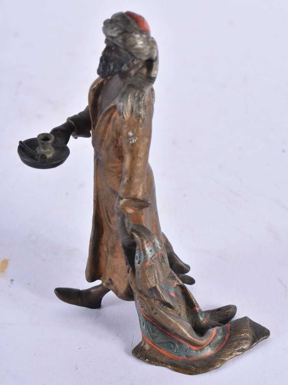 A Cold Painted Bronze in the manner of Bergman od an Arab Lighting his way to Bed. 9.2 cm x 6.2 cm x - Image 2 of 4