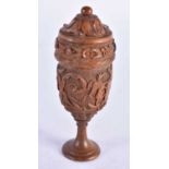A Coquilla Nut Vase and Cover carved with Armorial Crest. 12.3 cm x 4.7cm, weight 78.7g
