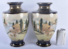 A LARGE PAIR OF LATE 19TH CENTURY JAPANESE MEIJI PERIOD SATSUMA VASES painted with landscapes.