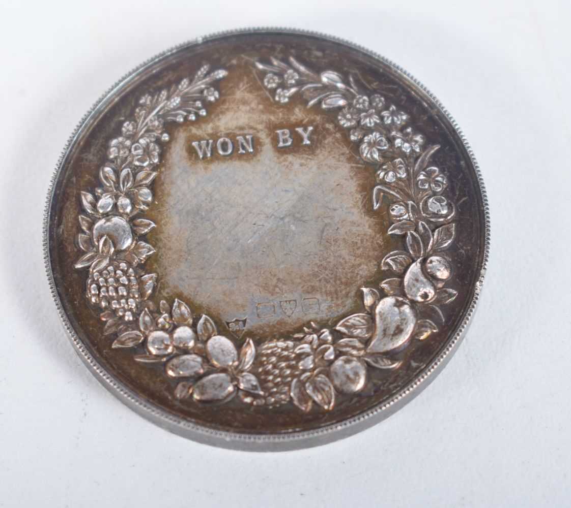 AN ANTIQUE CHESTER SEED GROWING SILVER MEDAL. 31.8 grams. 3.75 cm diameter. - Image 2 of 2