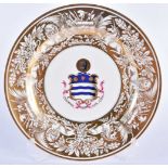 A FINE EARLY 19TH CENTURY CHAMBERLAINS WORCESTER ARMORIAL PLATE painted with a central dog crest,