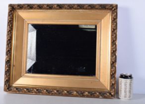 A Giltwood and plaster framed mirror 45 x 54 cm