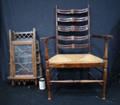 A 19th Century Burr Inlaid palour chair with Rattan seat together with an antique Arts and Crafts