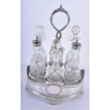 AN ANTIQUE SILVER PLATED CRUET SET. 29 cm x 18cm.