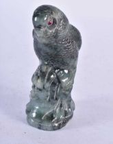 A 19th Century Carved Jade figure of a Budgie. 12cm x 6.5 cm x 4cm