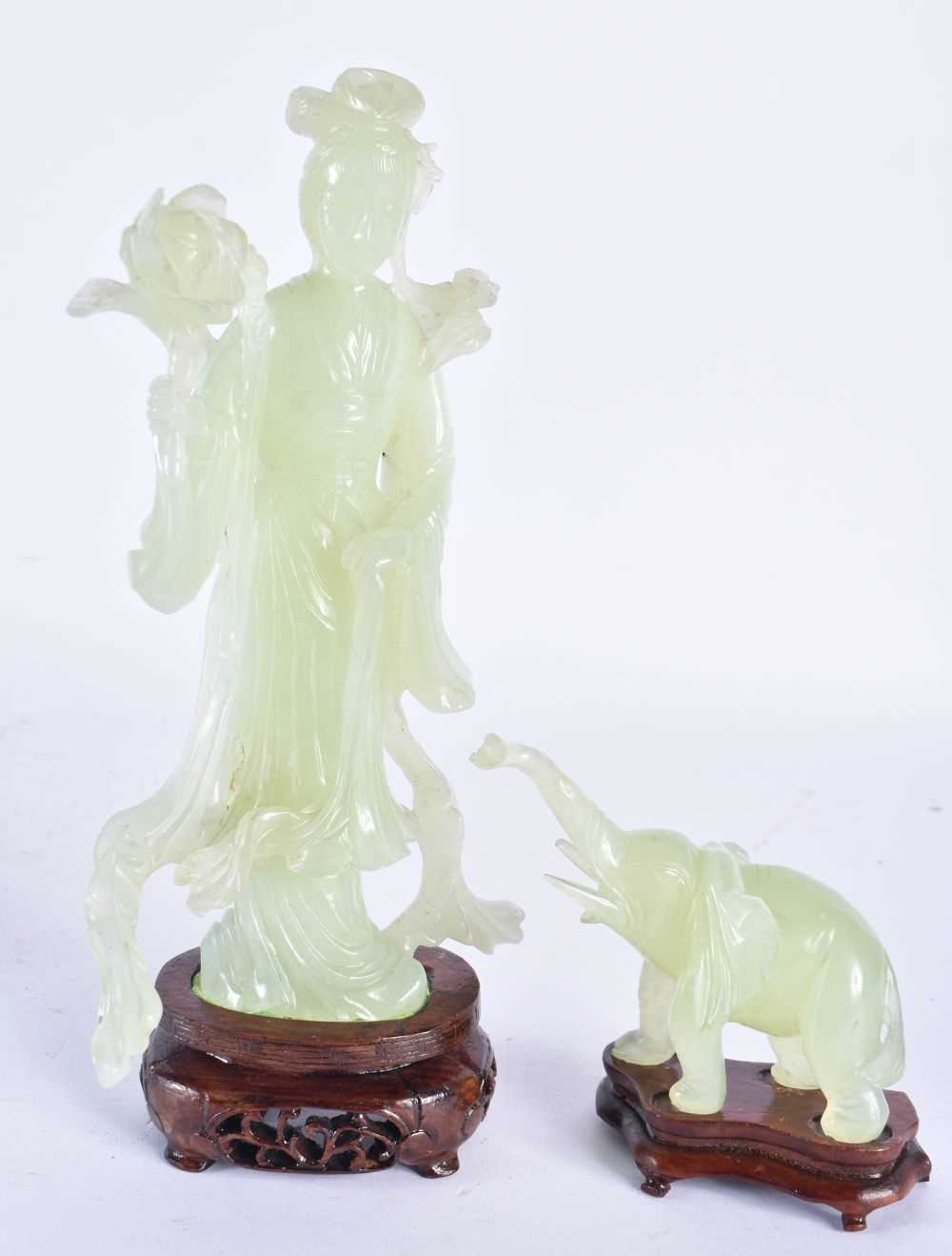 AN EARLY 20TH CENTURY CHINESE CARVED JADE FIGURE OF AN IMMORTAL Late Qing/Republic, together with