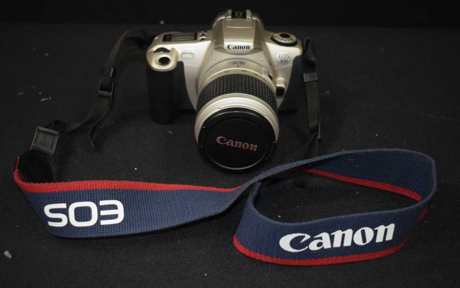 A collection of Cameras, Nikomat FT , Olympus IS 300, Cannon EOS 300 together with Accessories (5). - Image 3 of 8