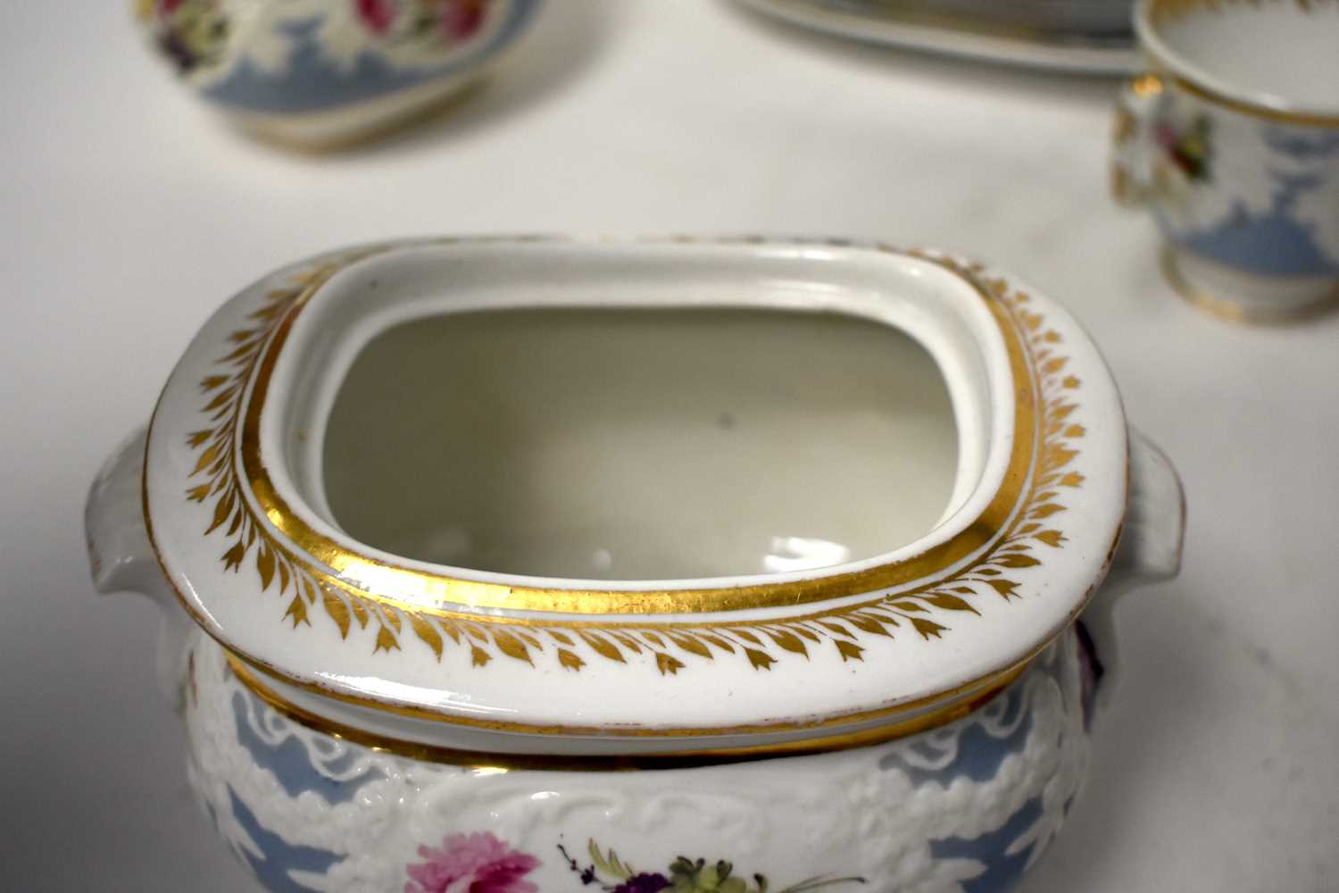 AN EARLY 19TH CENTURY CHAMBERLAINS WORCESTER PART TEASET painted with floral sprays, under a moulded - Image 34 of 36