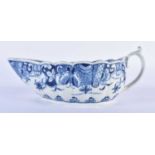 Worcester 'Doughnut Tree' sauce boat, of fluted form, the interior painted in blue with huts upon