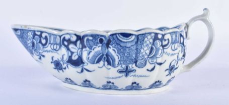 Worcester 'Doughnut Tree' sauce boat, of fluted form, the interior painted in blue with huts upon