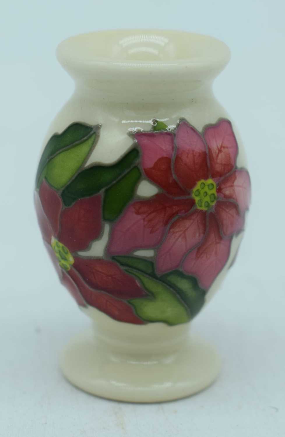 Boxed Moorcroft Seasonal Flower Collection Poinsettia Miniature Vase 2020 together with a Slipper - Image 5 of 10