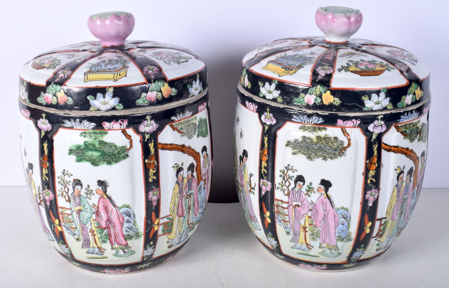 A pair of Chinese porcelain polychrome lidded jars decorated with figures in panels 28cm (2). - Image 7 of 10