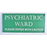 A PSYCHIATRIC WARD SIGN. 27 cm x 12 cm.