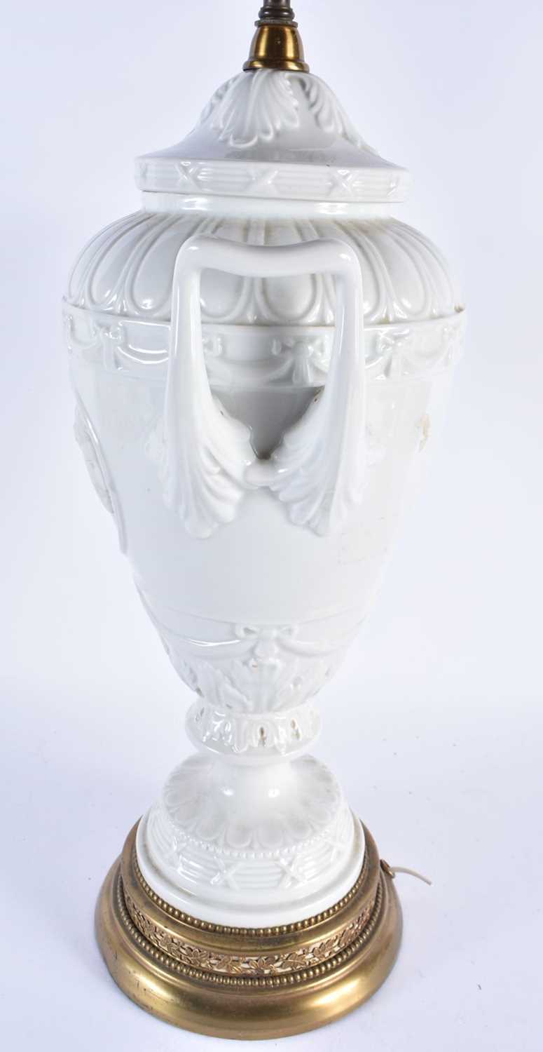 A LARGE CONTINENTAL TWIN HANDLED WHITE PORCELAIN VASE LAMP. 68 cm high. - Image 3 of 6