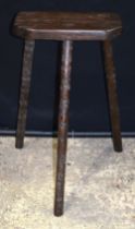 An wooden Cutlers stool 61 zx 36 x 21 cm.