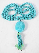 A Turquoise and Jade Pendant Necklace. Length 90cm, weight 87g