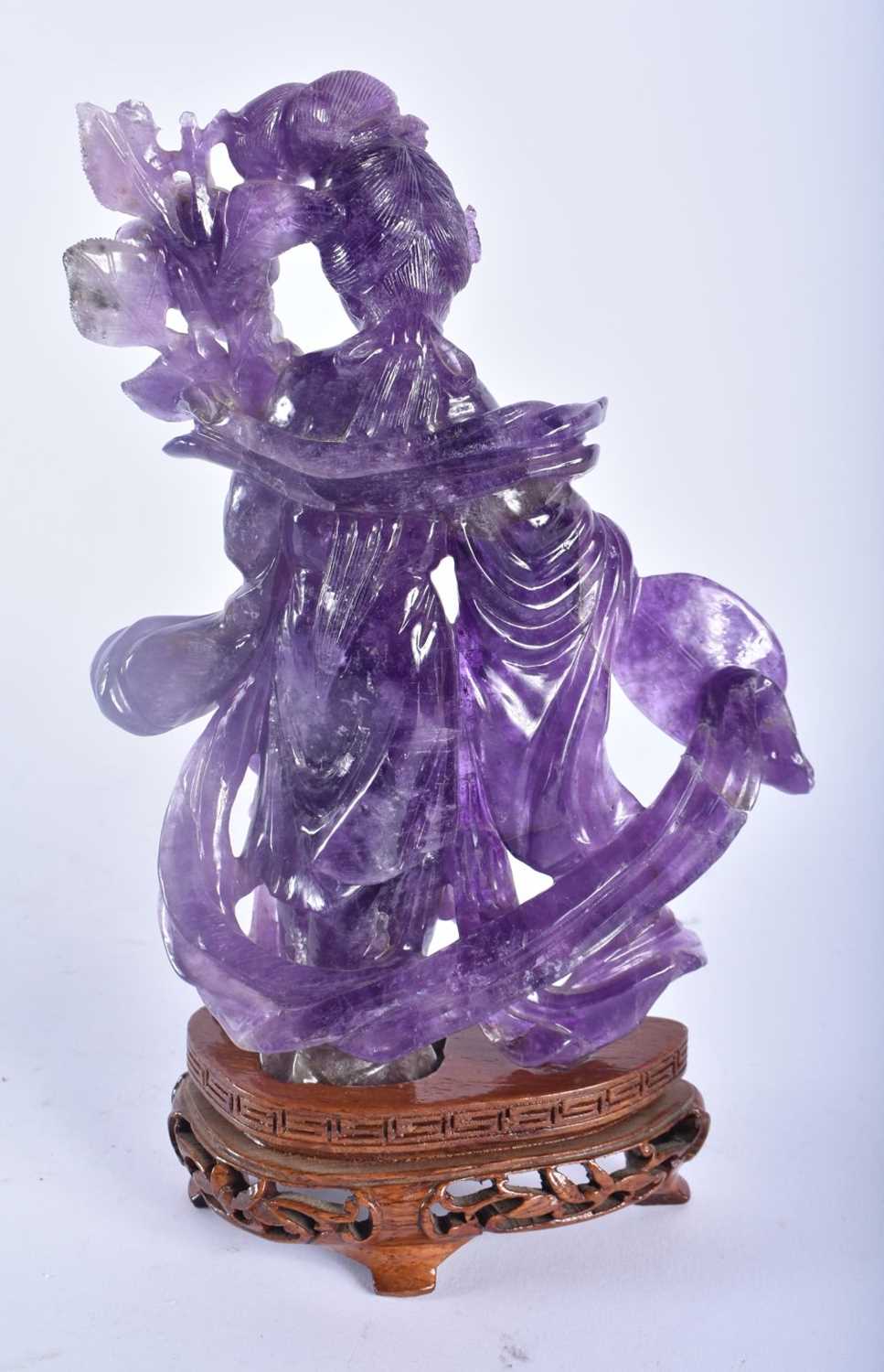 A 19TH CENTURY CHINESE CARVED AMETHYST FIGURE OF A FEMALE Late Qing, together with a stone carving - Image 6 of 7