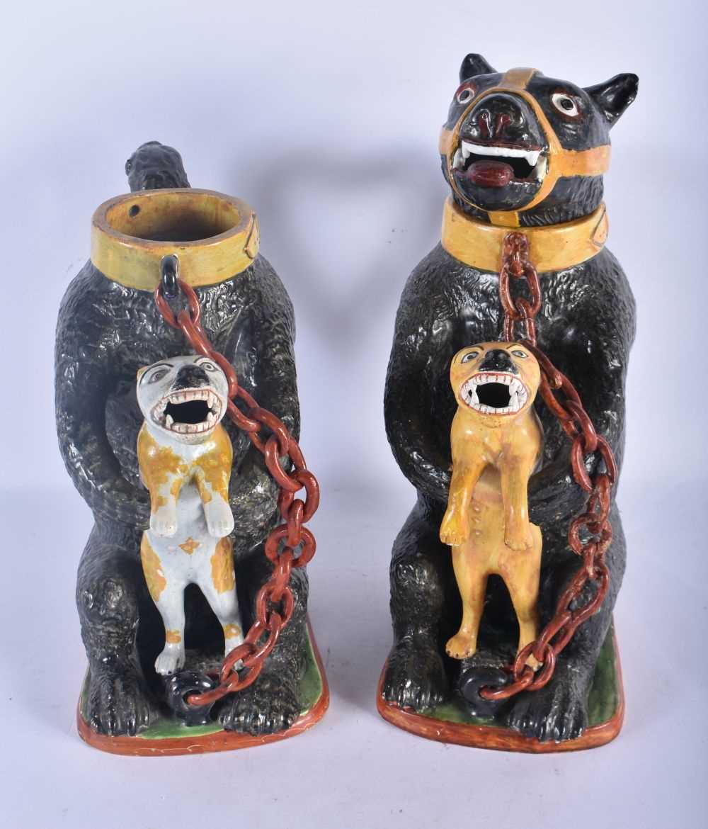 A PAIR OF LATE 18TH/19TH CENTURY PRATTWARE BEAR BAITING JUGS each modelled holding a scowling beast, - Image 2 of 4