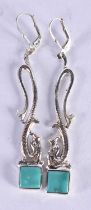 A Pair of Silver Earrings in the form of Serpents...... Stamped Sterling, 6.8 cm x 0.9cm, weight 7.