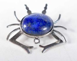 A SILVER AND LAPIS LAZULI SPIDER BROOCH. 4.6 grams. 2.75 cm x 3 cm.