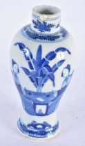 A 19TH CENTURY CHINESE BLUE AND WHITE PORCELAIN VASE Qing, painted with a figure beside a table.