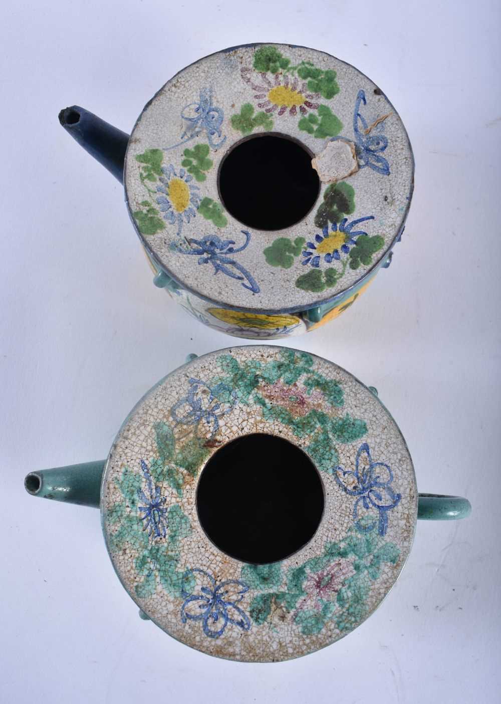 A PAIR OF 19TH CENTURY CHINESE ENAMELLED YIXING POTTERY TEAPOTS painted with flowers. 15 cm wide. - Image 4 of 5