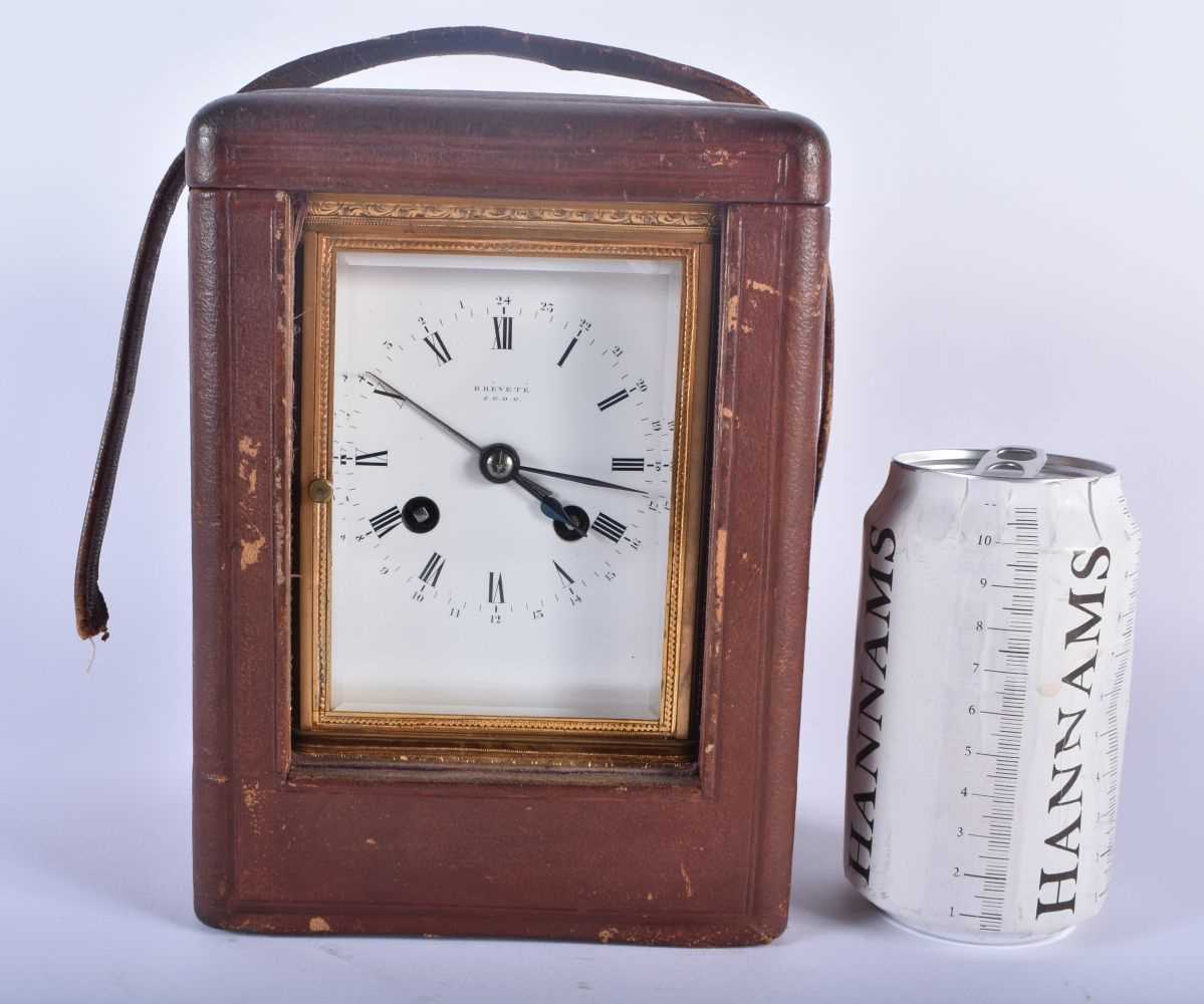 A LARGE ANTIQUE FRENCH CARRIAGE CLOCK with finely engraved case. 22.5 cm high inc handle.