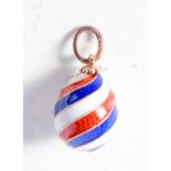 A Continental Gold and Enamel Egg Pendant. Stamped 56. 2.6 cm x 1.3 cm, weight 5.2g